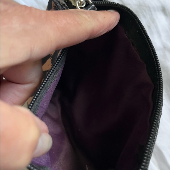 Modella Black and Tan Leopard Cosmetic Bag
7.5” X 5.5” - Picture 5 of 9